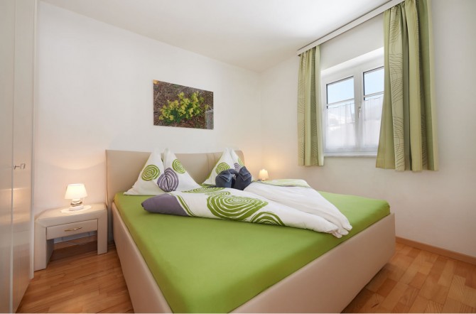 Schlafzimmer in den Apartments Geistlinger in Flachau